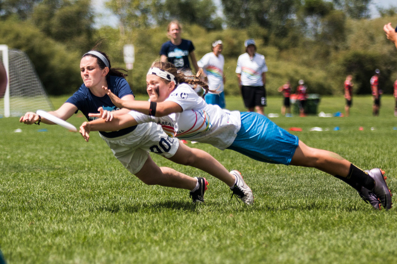 Lilly Shapiro (Superior #00) and Chloe Carothers-Liske (Happy Cows #64) lay out for a disc. Photo: Daniel Thai -- UltiPhotos.com